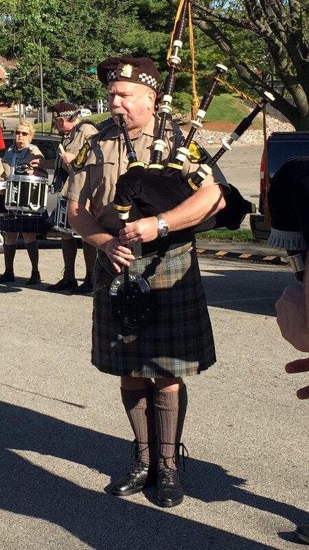 Kevin Park piping in a summer parade